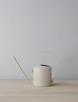 Stelton 100 18 Stelton Original Flower Watering Can 1.7 L. Soft Sand Lifestyle AI Assisted