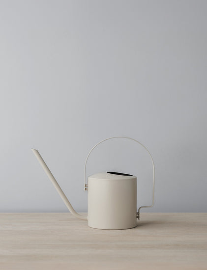 Stelton 100 18 Stelton Original Flower Watering Can 1.7 L. Soft Sand Lifestyle AI Assisted