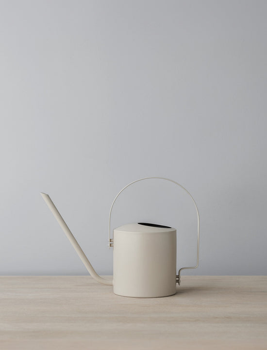 Stelton 100 18 Stelton Original Flower Watering Can 1.7 L. Soft Sand Lifestyle AI Assisted